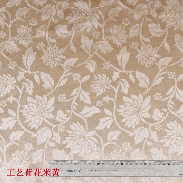 厂家现货中国风米黄色荷花面料100d*75d梭织面料染色暗纹大提花布