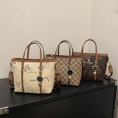 2023跨境新款時尚小眾手提單肩包百搭寬帶斜挎水桶包洋氣斜挎