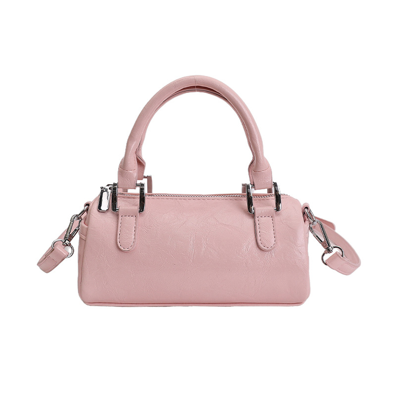 Nicho de diseño retro bolso de mano mujer 2026 primavera nuevo bolso de hombro sensación diaria de moda oblicuo bolso cilíndrico