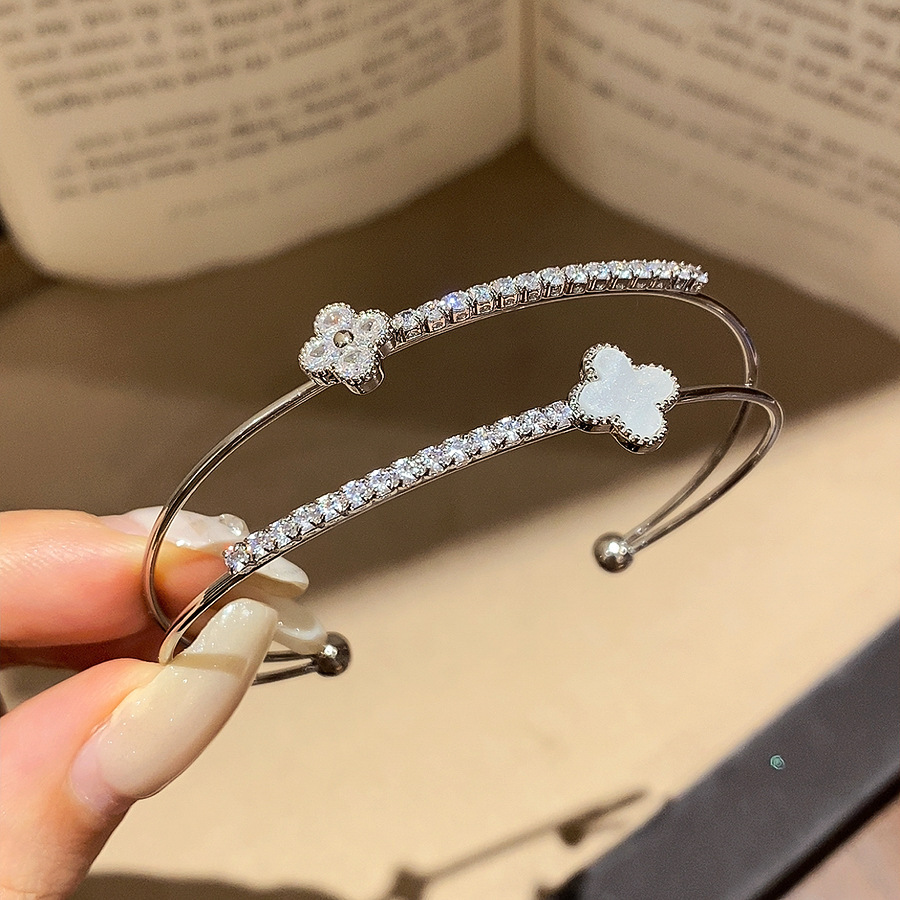 El temperamento francés arco de zircon pulsera de doble capa dulce ins pulsera de viento lujoso ligero de alto nivel sensación de joyas versátiles para mujeres