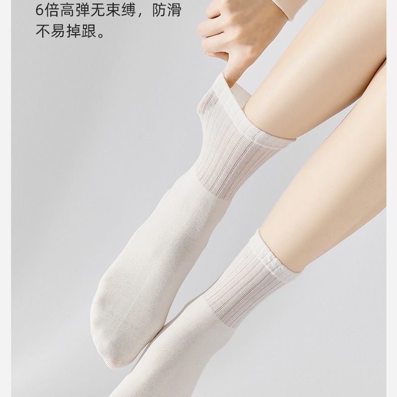 Alto valor de color color sólido versátil verano sexy respirado y suelto calcetines de mujer absorción de sudor antiolor pila de calcetines de moda