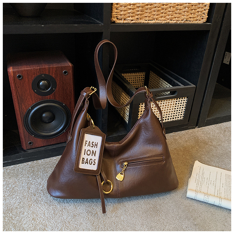 Bolsas retro de gran capacidad para mujeres 2026 nuevo estilo coreano de ocio de hombro con bolsas de brazalete inclinadas para viajar bolsas de mano simples