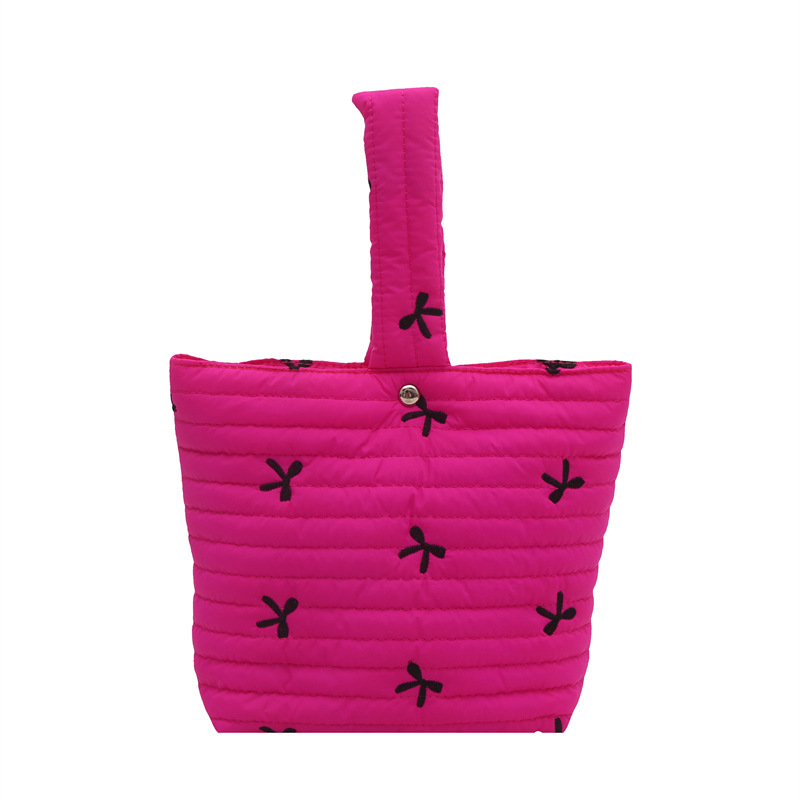 Moda coreana pequeña y fresca bolsa de bordado de arco de invierno 2024 nueva bolsa de maquillaje a rayas de diseño de nicho