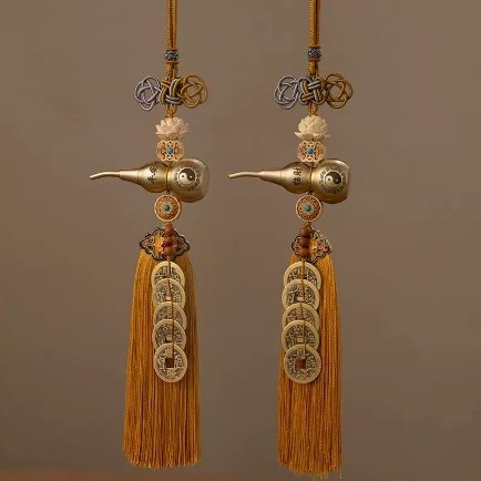 The door to the neighbor's door - hanging inside the own door - a pair of gourds