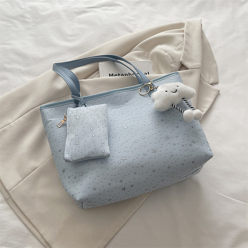 2026 primavera nueva bolsa de hombro de gran capacidad bolsa de brazo universal tendencia transfronteriza dulce viento bolso de mano bolso de mujer