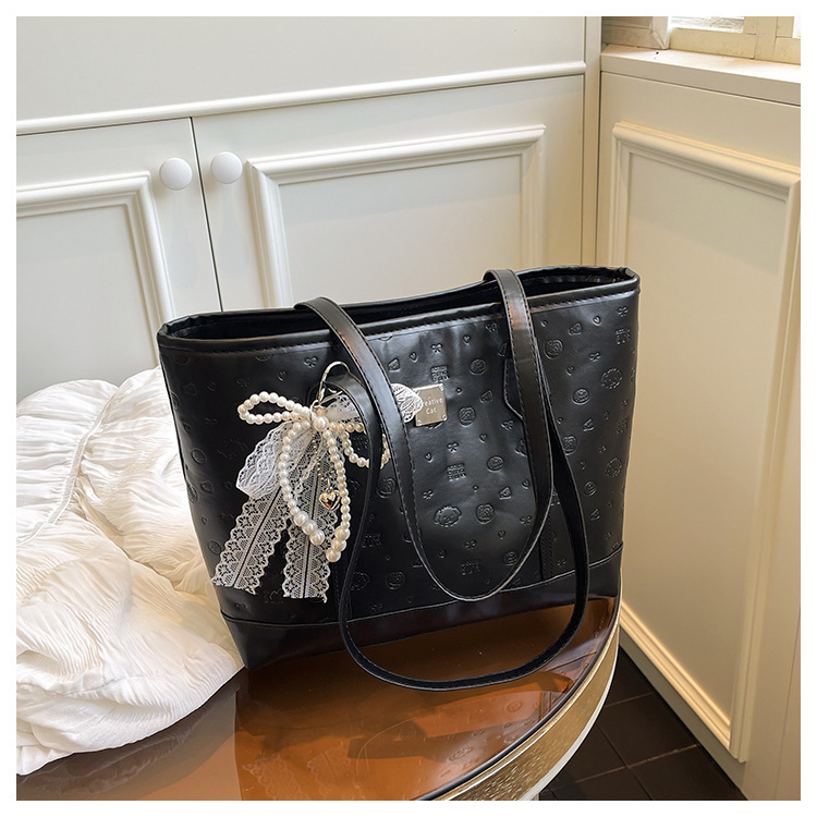 European and American Fashion Simple Large-Capacity Tote Bag for Women 2025 New High-Value Casual Embossed Shoulder Handbag European and American Fashion Simple Large-Capacity Tote Bag for Women 2025 New High-Value Casual Embossed Shoulder Handbag