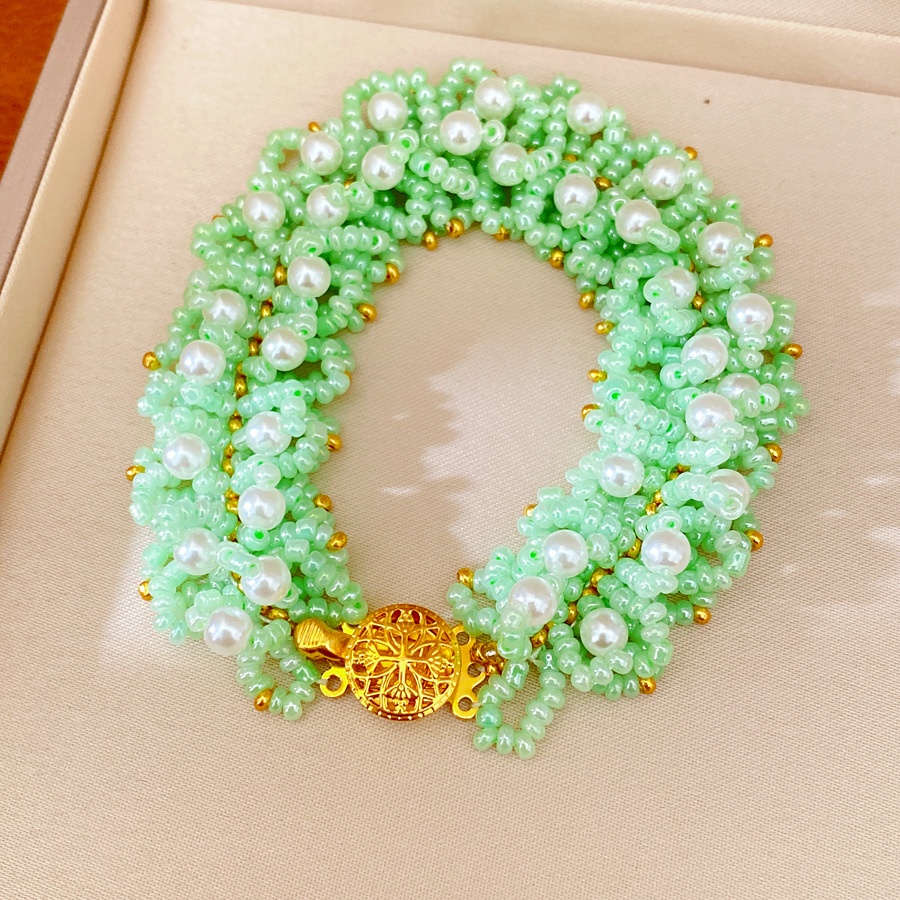 Accesorios de vacaciones pulseras de perlas ligeras de lujo nicho pulseras de alto nivel personalidad temperamento de moda joyas al por mayor