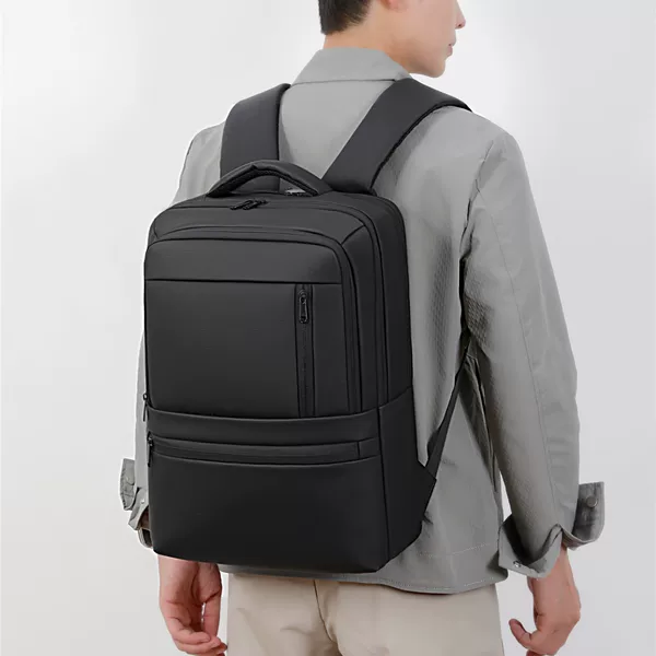Cross-border large-capacity backpack, multifunctional, simple, stylish, suitable for business travel, students, and commuting, with a waterproof coating and designed to hold a laptop
