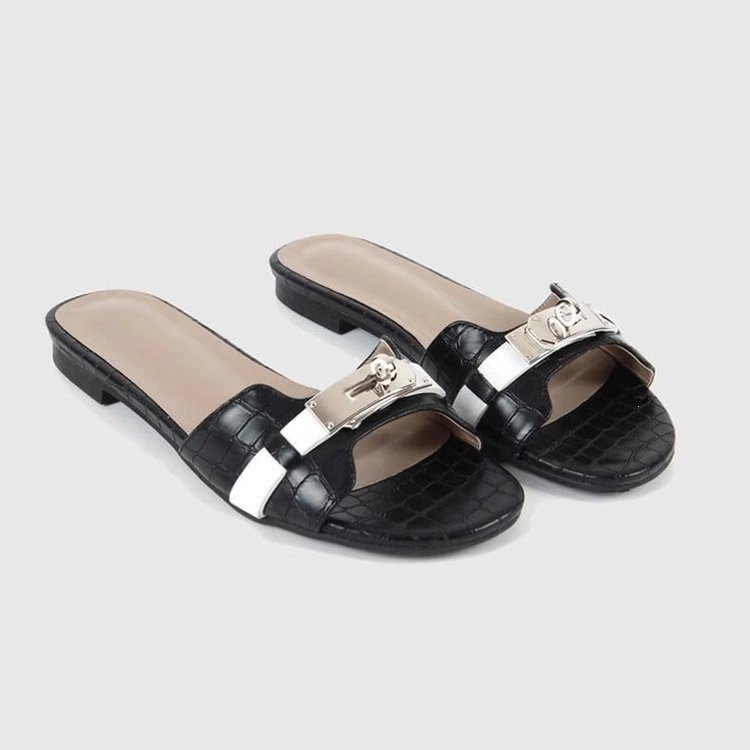 Pequeño botón de oro cocodrilo patrón de dedos franceses zapatillas de fondo plano para mujeres 2026 nuevas zapatillas frías de playa de arena suave