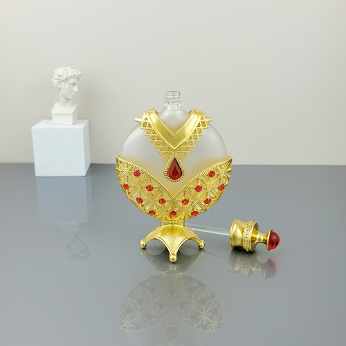 High-end Dubai perfume bottle, Middle Eastern Arab essential oil bottle, glass perfume splitter bottle, retro metal decorative piece for wholesale
