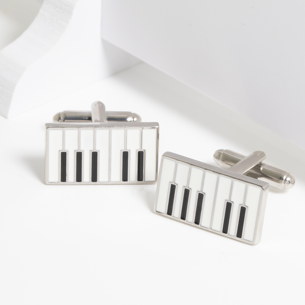 Gemelli in metallo per pianoforte di alta qualità, semplici chiodi a goccia in lega per polsini a righe bianche e nere all'ingrosso_voghion.com