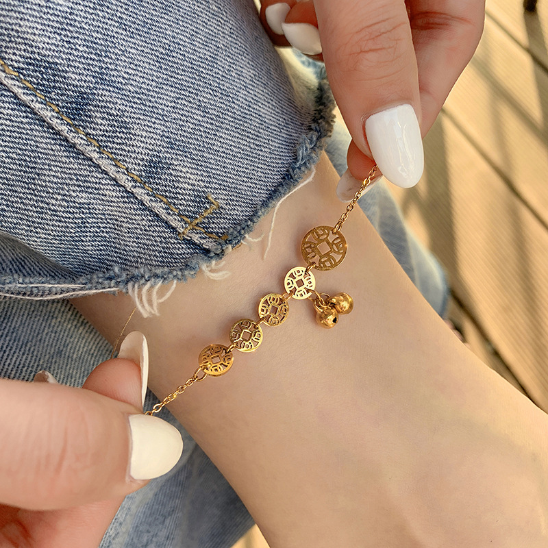 Wenjian moda campana cobre moneda tobillera hembra Qian Duo tobillera temperamento personalidad borla color oro tobillo joyería anti-gota