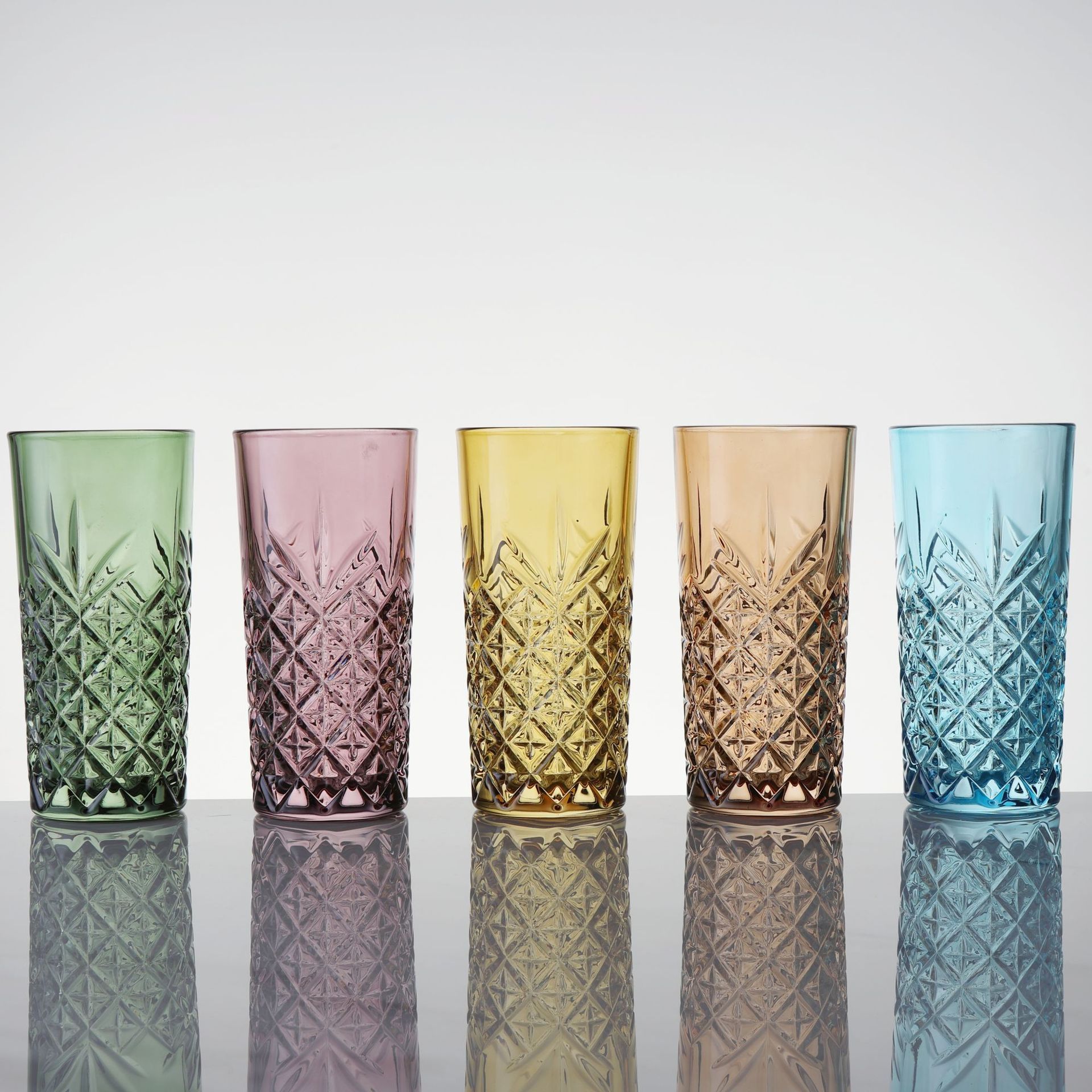 Regalo de vidrio de chorro de color espesado taza multifuncional comercial de color deslumbrante taza de color geométrico taza de vino multicolor