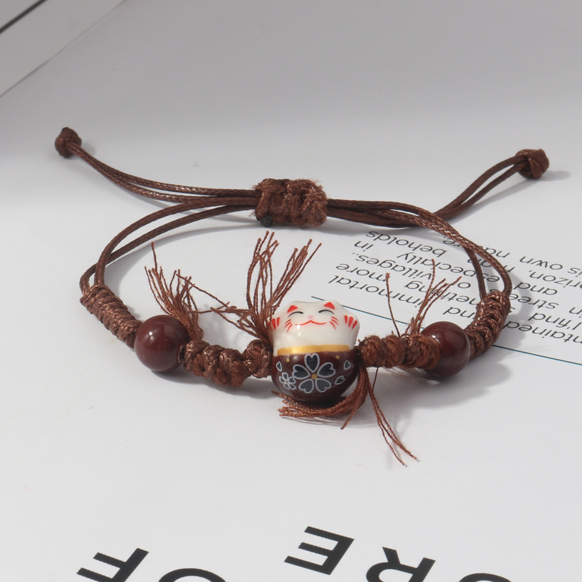 카키색 태슬 복고양이 팔찌