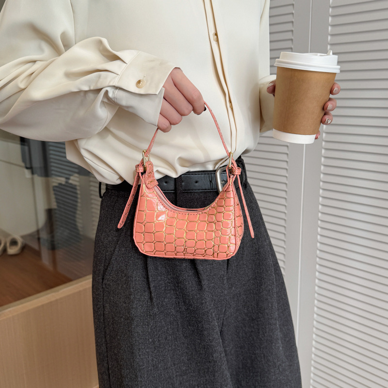 Bolso de moda coreano de piedra para hombres y mujeres, bolso de cambio de color sólido mini 2026 nuevo bolso para niños