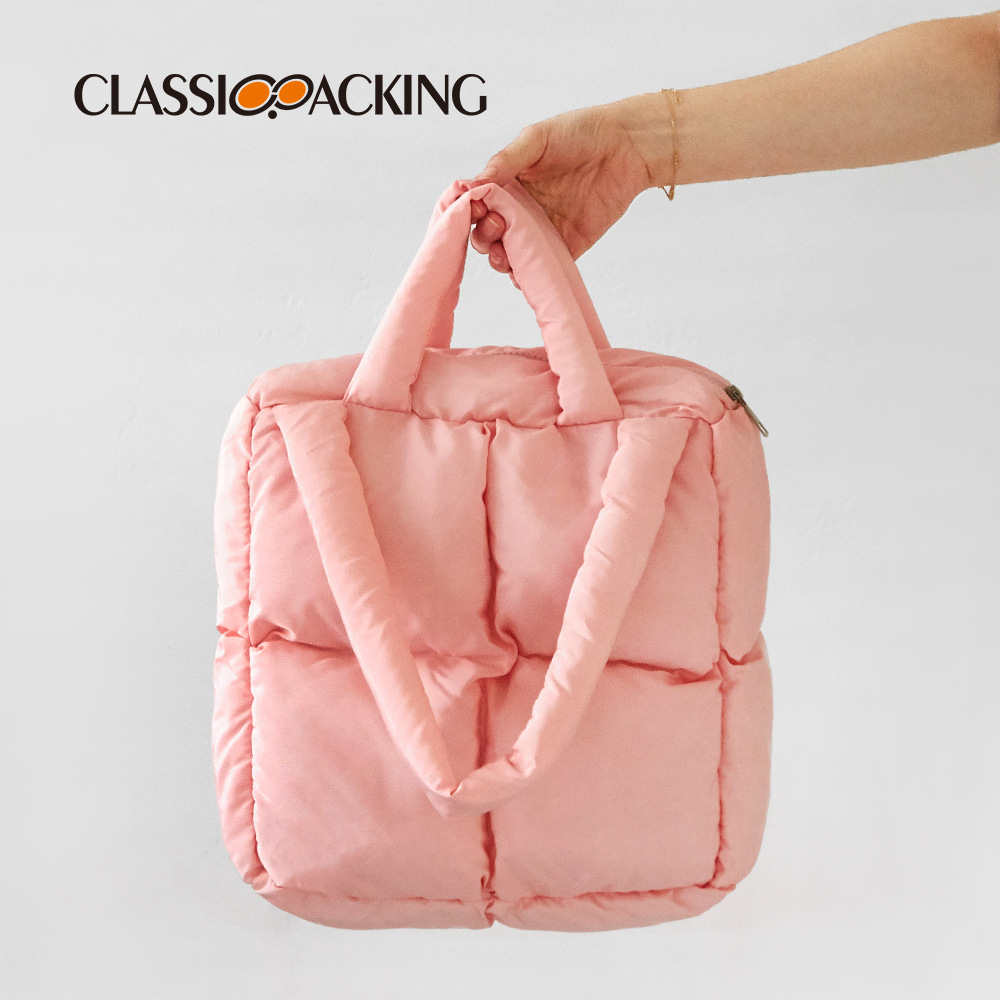 2023 nuevo bolso de otoño e invierno bolso de diseño de nicho bolso de mano lleno de algodón de Corea del Sur bolso de algodón acolchado de alta calidad chaqueta abajo bolsa