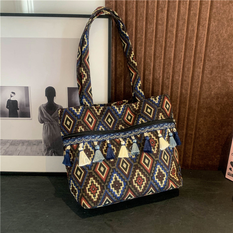 Bolsos de estilo nacional, bolsos de nicho, bolsos de hombro de estilo vacacional, bolsos de mujer, bolsos de primavera de 2025.