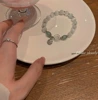 Зелёный клубничный кварц с кошачьим глазом