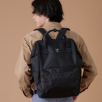 Cross border solar system Japan Lotte Backpack Black gold schoolbag Chaopai man travel Gold mouth knapsack backpack