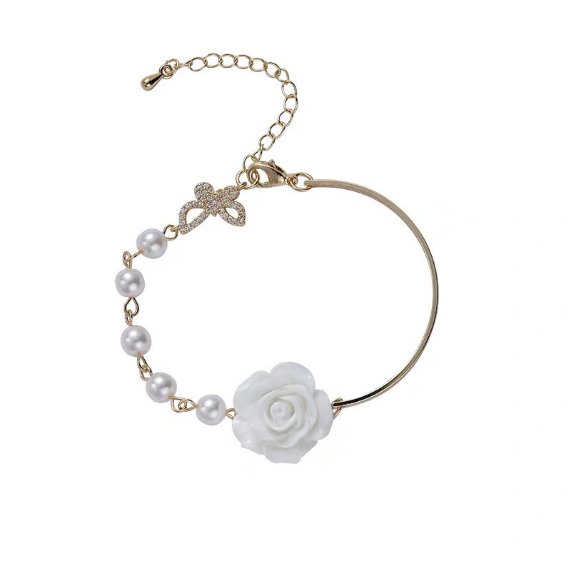 Estilo Simple Flor Nudo De Lazo Aleación Embutido Circón Mujeres Pulsera Aretes display picture 2