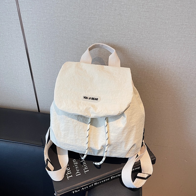 Mochila de moda pequeña mochila casual para mujeres 2025 nueva bolsa de viaje de gran capacidad bolsa de viaje al aire libre