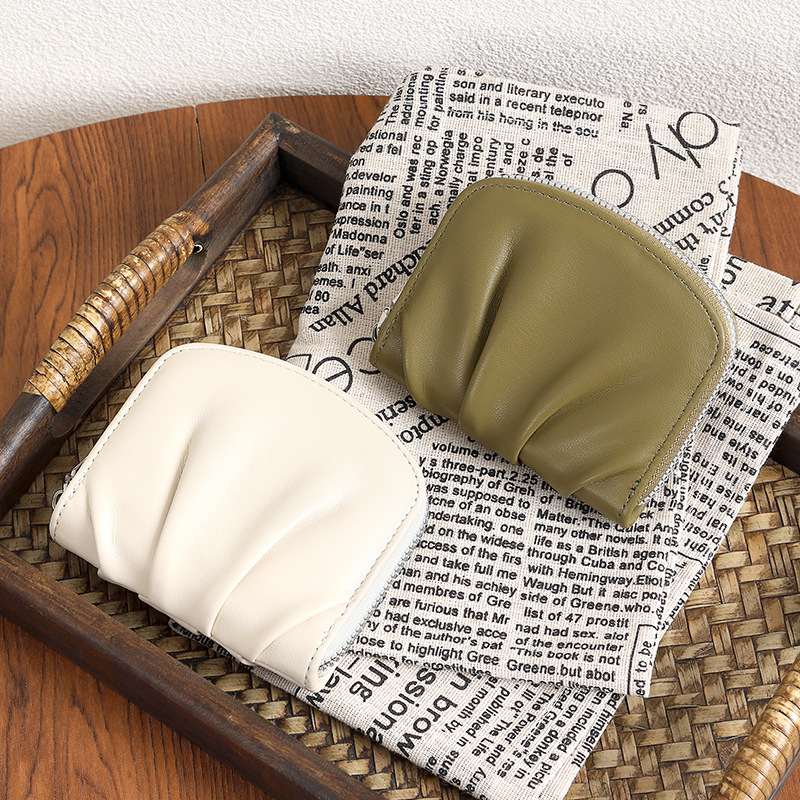 2024 nuevo pliegue sensación de billetera de mujer simplista lindos japoneses y coreanos pequeños bolsos de cambio multifuncional billetera en línea