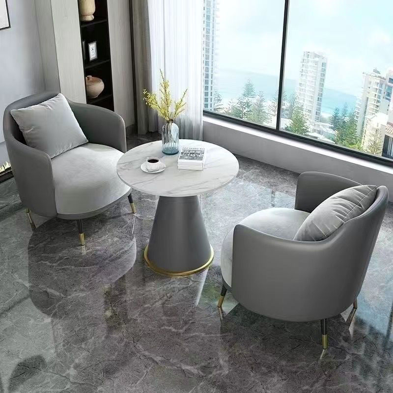 Simple y de lujo, sofá individual, mesa de café, combinación de hotel de ocio, recepción de la oficina de ventas, negociación de mesas y sillas, salón de belleza, reunión de invitados