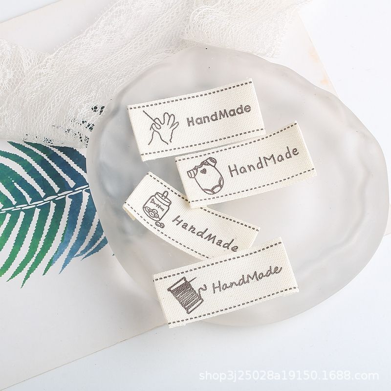 Pure Cotton In-Stock Handmade Printed Label Fabric Label Folded Collar Label Coffee Color Baby Clothes Needle Thread Spool Label Accessories Wholesale Pure Cotton In-Stock Handmade Printed Label Fabric Label Folded Collar Label Coffee Color Baby Clothes Needle Thread Spool Label Accessories Wholesale
