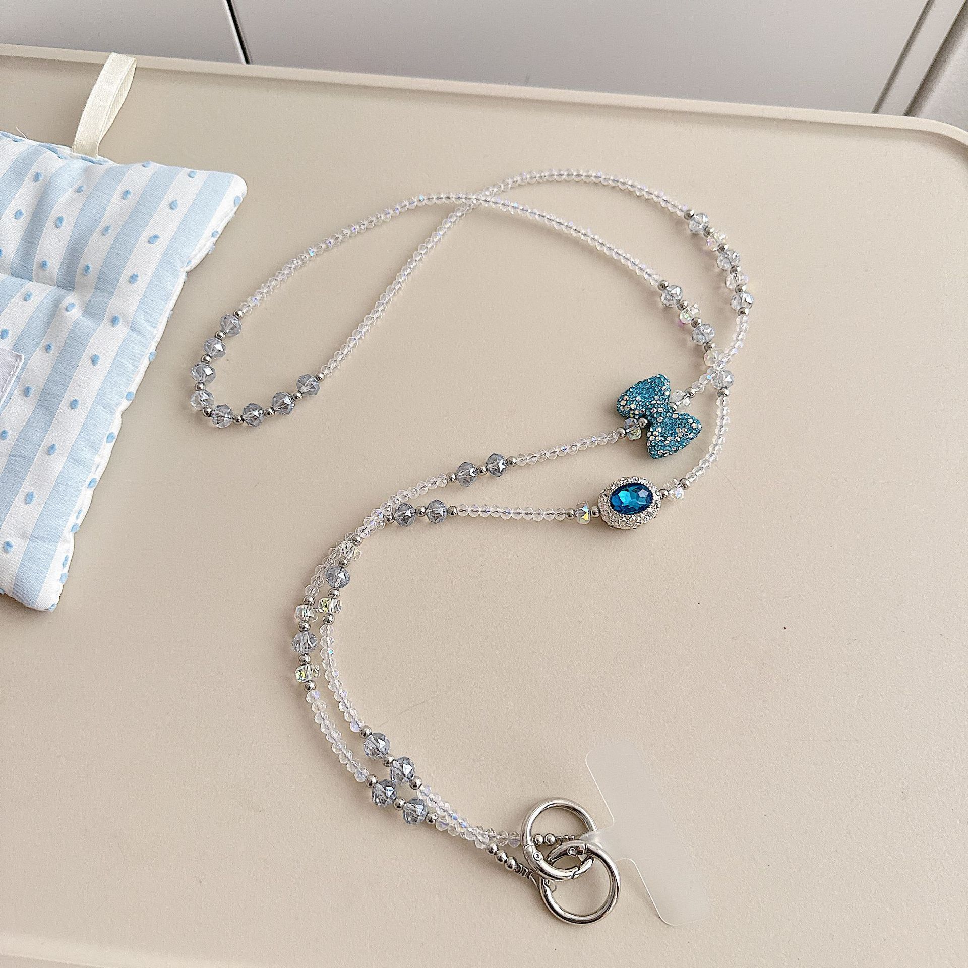 Boutique hecho a mano de alta gama teléfono móvil cadena colgante ins mujer ligero lujo dulce fresco estilo princesa moda teléfono móvil cadena colgante mensajero largo