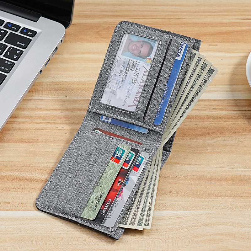 Cartera de color en contraste para hombre corta 2025 nueva marca de moda joven estudiante personalidad simple clip de camioneta plegable ultrafino