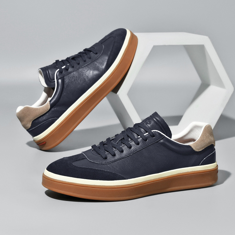 Zapatos de skate de primavera 2026 nuevos zapatos de cuero de capa de cabeza de entrenamiento de cuero de cordón plano de negocios casual zapatos de hombre versátiles