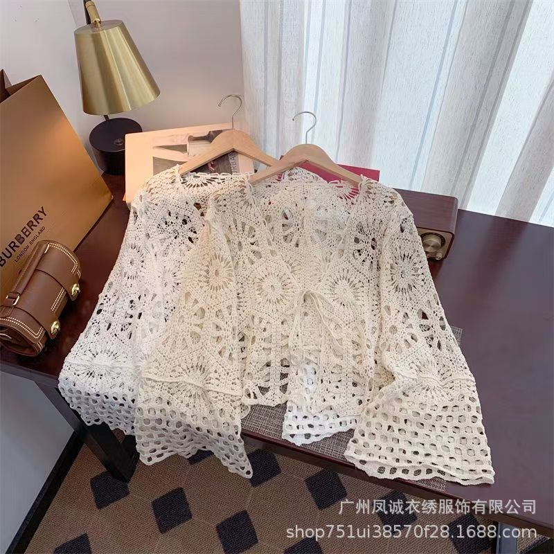 Spring and Summer Crochet Hollow Lace-Up Knitted Cardigan Women's New Style Holiday Style Long-Sleeved Short Sun Protection Blouse Top