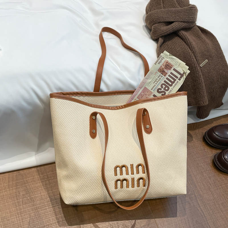 Bolsas retro transfronterizas de gran capacidad para mujeres 2026 nueva moda coreana nicho Zhong tote bolsas de hombro al por mayor