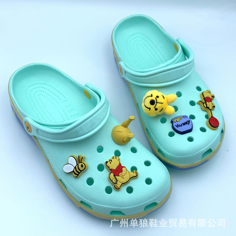 Verano nuevo agujero zapatos de dibujos animados Winnie el Pooh hombre y mujer ocio transpirable sandálias de playa suaves zapatillas fábrica al por mayor