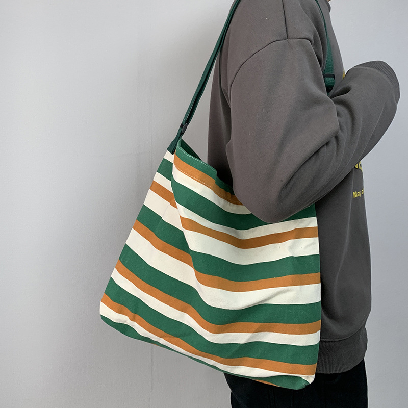 Nuevo Cruz-cuerpo bolsa de lona femenina de un solo hombro estudiante clase libro bolsa Bolsa de Comercio Exterior bolsa de la raya