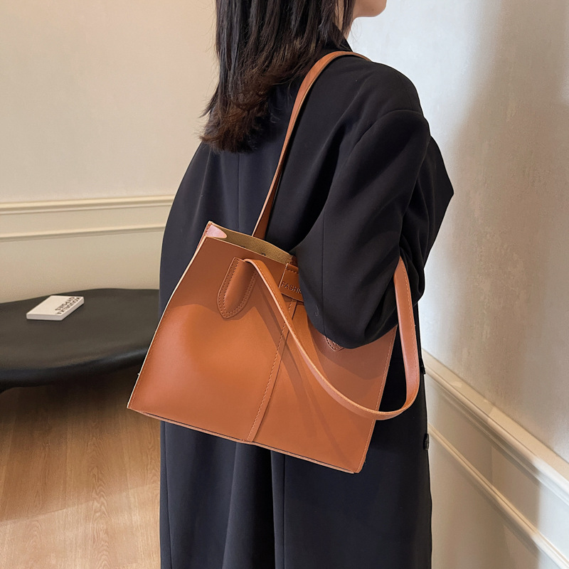 Retro textura de viaje coreano bolsos de mano estudiantes de moda simple bolsos de hombro de gran capacidad bolsos de brazo para mujeres