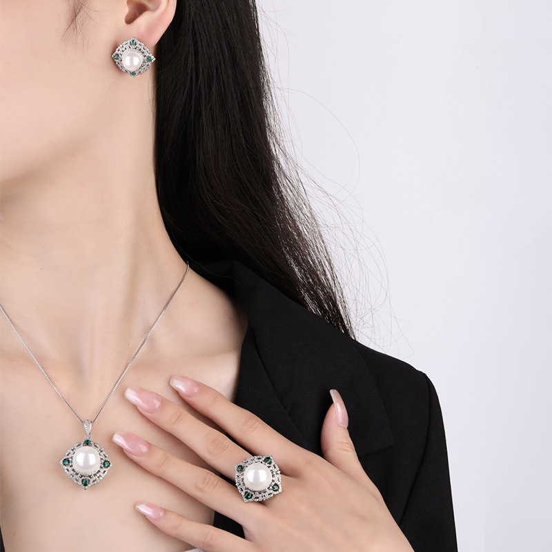 Zhuang Sheng joyas cobre inferior chapado en oro con incrustaciones de perlas fritillary coreano Esmeralda artificial diamante temperamento cuentas blancas traje