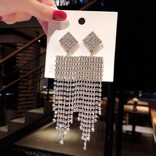 Stylish, exaggerated full-diamond tassel earrings for women—elegant, celebrity-inspired long drop designs that create a slimmer-looking face; trendy online ear accessories with eye-catching appeal.