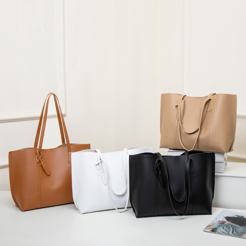 2025 otoño y invierno nuevo nicho Zhong tote bolso de cuero suave de gran capacidad para mujeres bolso de viaje de alta calidad bolso de hombro ocio