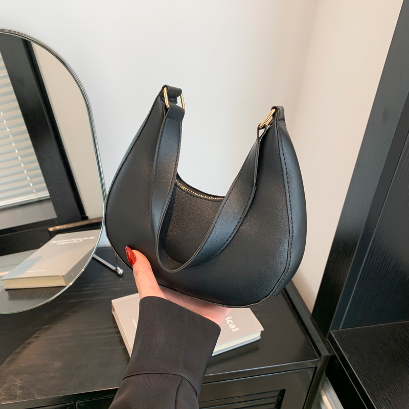 Französisches Nischendesign: Vielseitige, einfarbige Damen-Schultertasche 2024 – Trend: Halbmondförmig, hochwertig verarbeitet_voghion.com