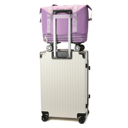 Extra-large capacity travel bag for students, short-trip business trips, storage, with built-in rolling suitcase and omnidirectional wheels—perfect for maternity prep or gym luggage.