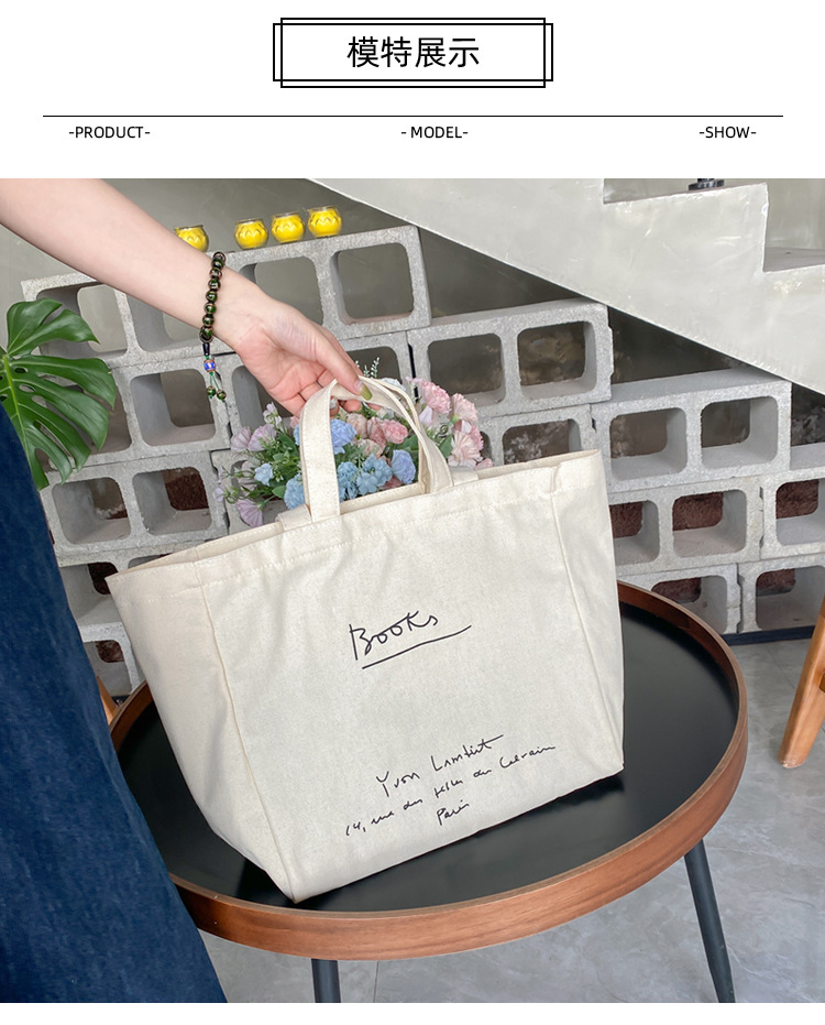 A large-capacity, sturdy Japanese-style canvas bag for women, a new 2022 simple bento handbag for girls to go to work undefined