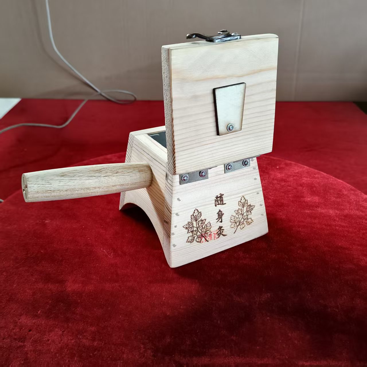 Solid Wood Moxibustion Box Trapezoid Hanging Needle Design Portable Self Moxa Therapy 250g in use