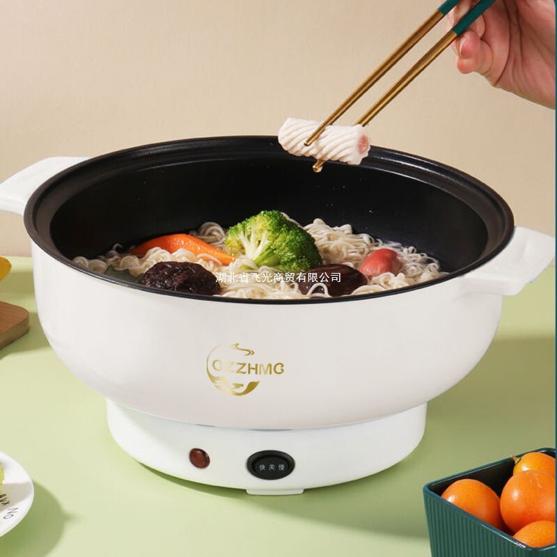 多機能料理鍋をしゃぶしゃぶして料理を炒めます。|undefined