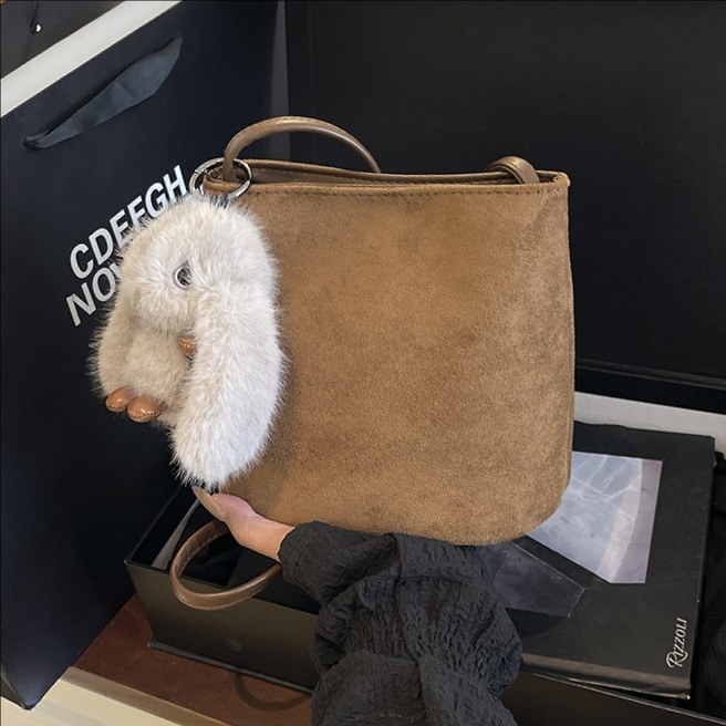 Cross-border 2025 otoño y invierno nuevo esmaltado bolso de cubo de agua nicho de mujer alta sensación bolso de hombro de moda coreana bolso de mochila