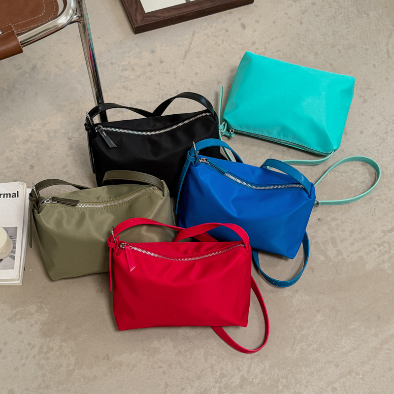 Nicho coreano universal bolso pequeño ligero para mujeres 2026 verano minimalista viaje diario ocio mochila de hombro