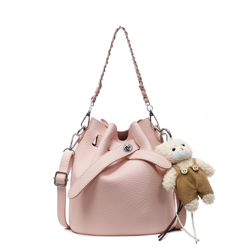 2025 nuevo estilo estilo caliente bolso de cubo coreano bolso de hombro de alto valor para mujer bolso de mensajero simple casual de todo fósforo