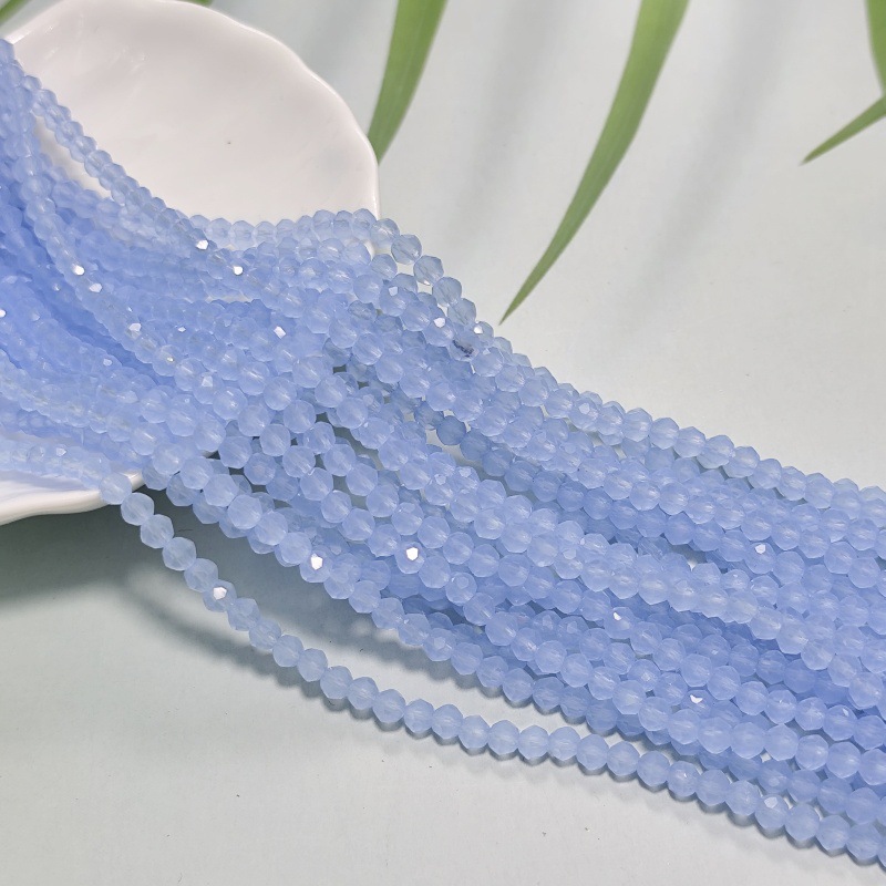 Cuentas planas transfronterizas Cuentas de vidrio Jingjing Cuentas sueltas de bricolaje hechas a mano Accesorios de ropa Cadena de teléfonos móviles Accesorios de joyería al por mayor