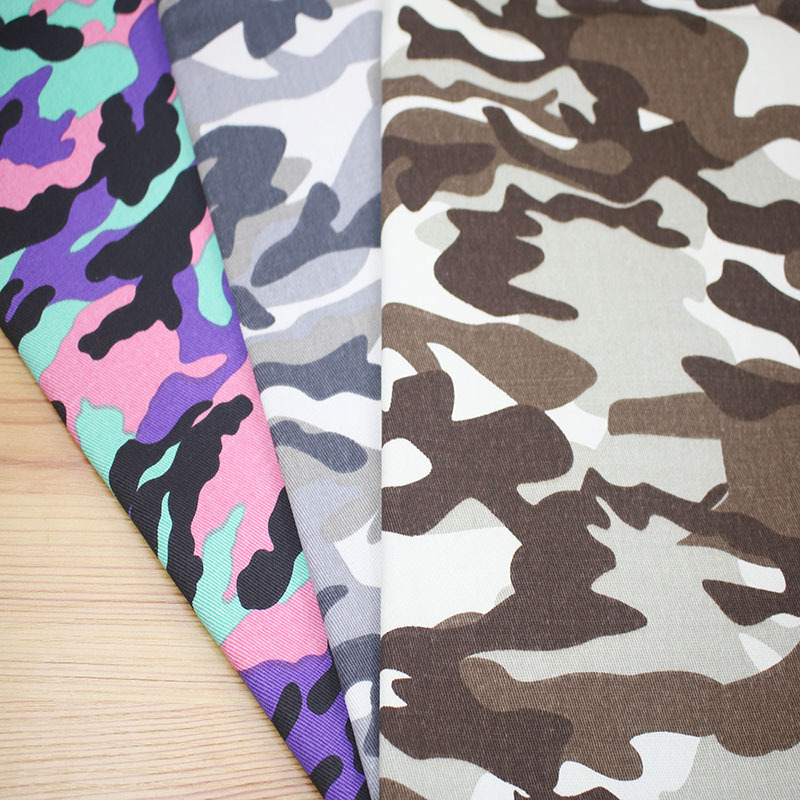 现货男女装中裤迷彩印花面料 16S斜纹纱卡迷彩 帽子休闲服装面料