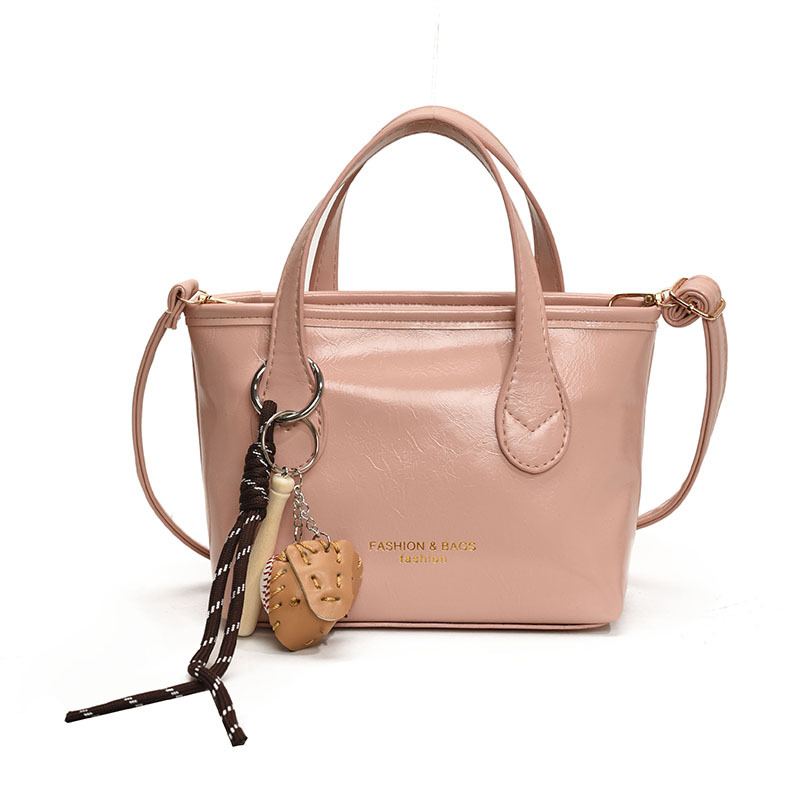 Bolso de cubo de textura de color sólido para mujer 2025 primavera nueva moda bolso de mensajero coreano estilo occidental de alta gama para mujer